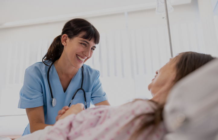 nurse and patient looking t each other happily